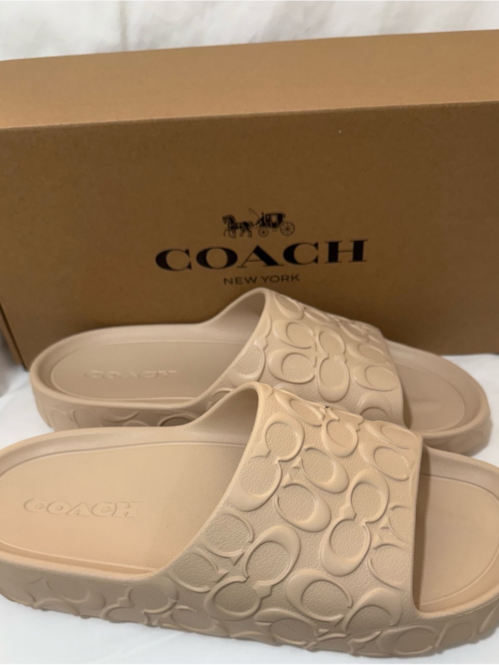 Brand new! Men’s size 11. Coach Bay Slides Sandals in Ivory